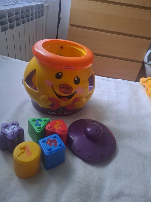 Garnuszek Fisher Price