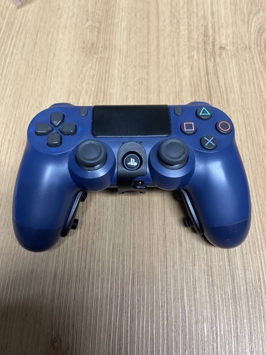 Comando playstation 4 com 4 botões traseiros em bom estado