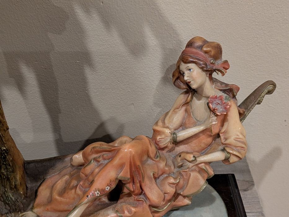 Estatueta de loiça64564191156354122
