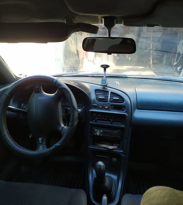 машина mazda 323