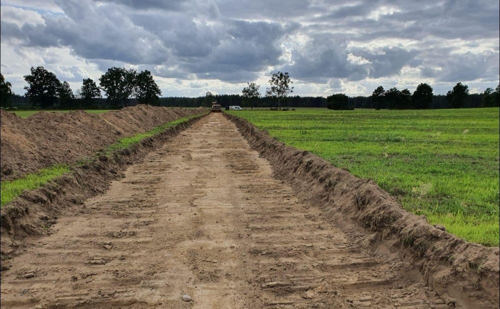 Usługi Koparką,Koparko-ładowarką