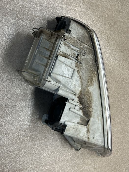 Reflektor  lewy lampa Octavia 04-08