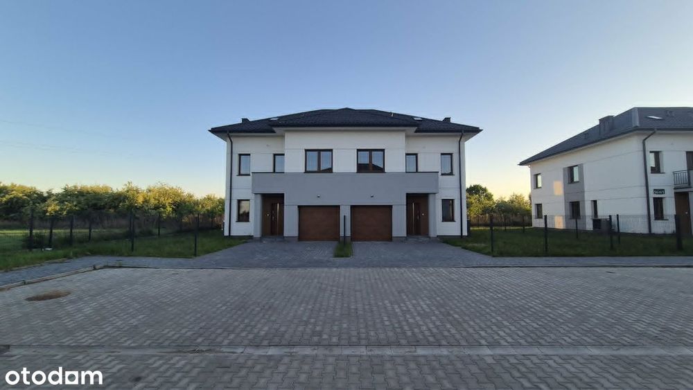 Domy z garażami i dużymi ogródkami na świetnym osiedlu.