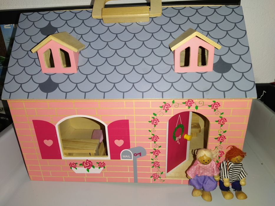 Casa de bonecas portátil