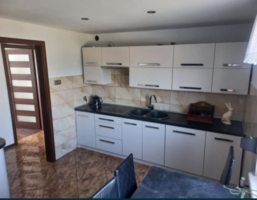 Sprzedam mieszkanie 2 pokojowe 69,80 m2, ogród garaż piwnica