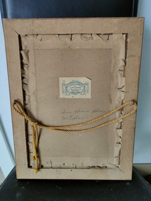 Moldura antiga com imagem da "Imaculada Conceição".