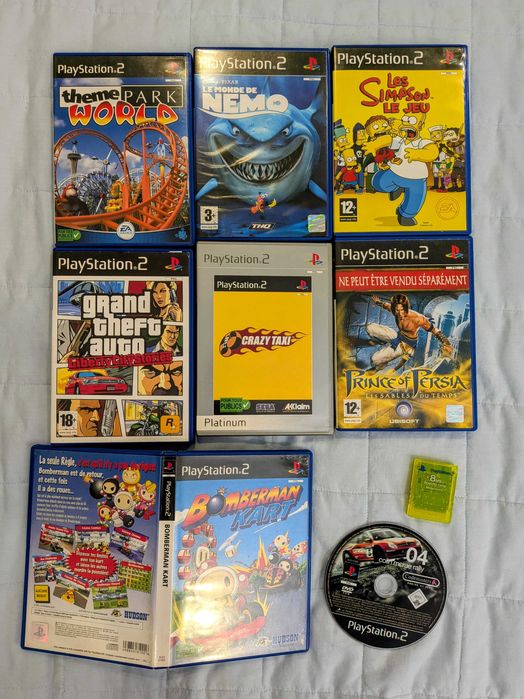Playstation 2 + jogos + 1 comando + cartão de memória