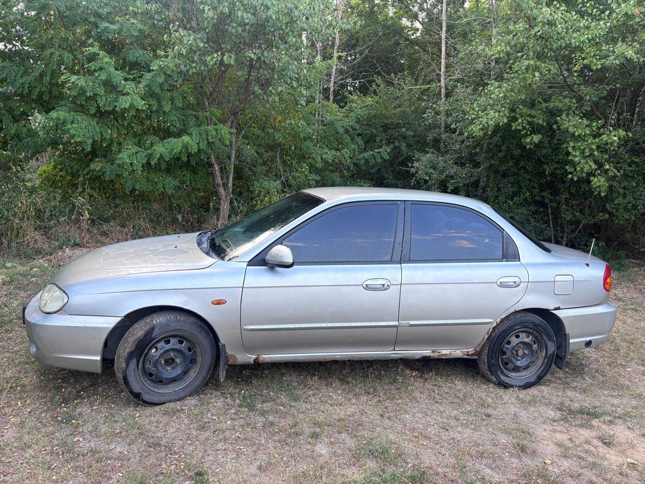 Kia Sephia 2003, Газ/Бензин