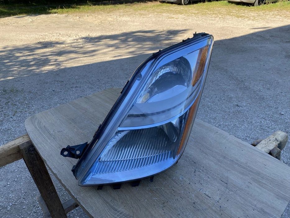 LAMPA PRZEDNIA LEWA TOYOTA PRIUS II 06-09 XW20 TYC 20-6876B 817047160