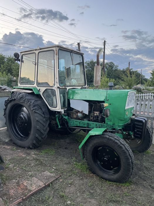 Трактор ЮМЗ 6 з прицепом, культиватором і марком