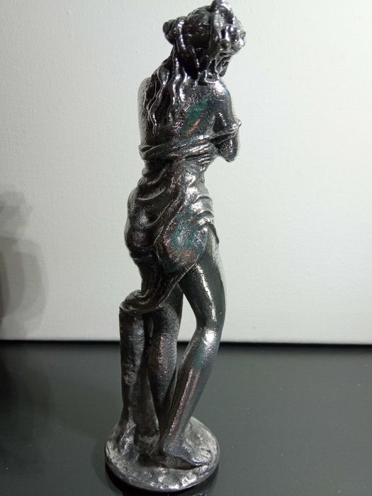Estatueta figura em Metal polido