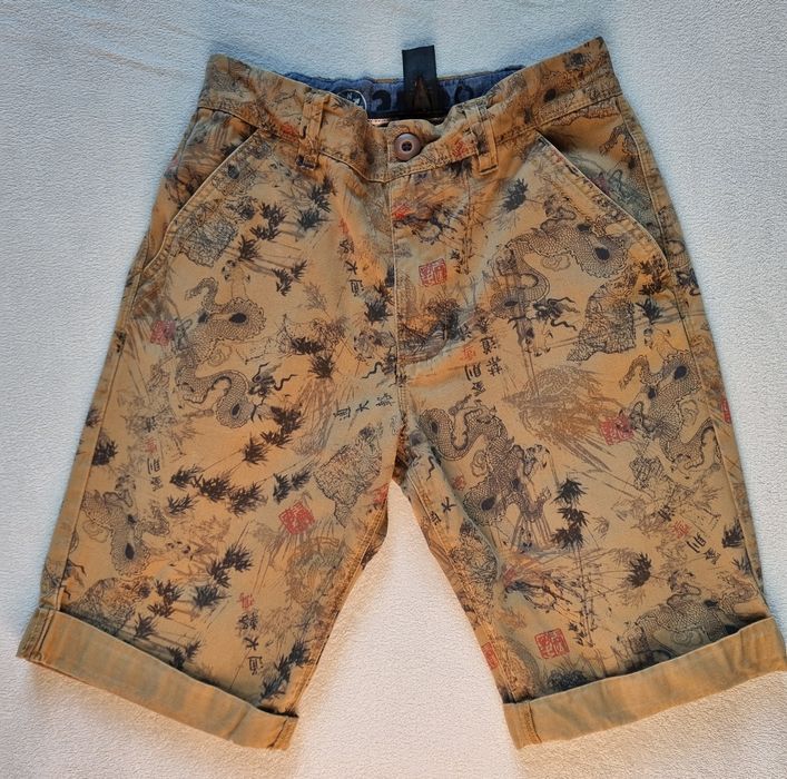 Beżowe spodenki Next 146/152