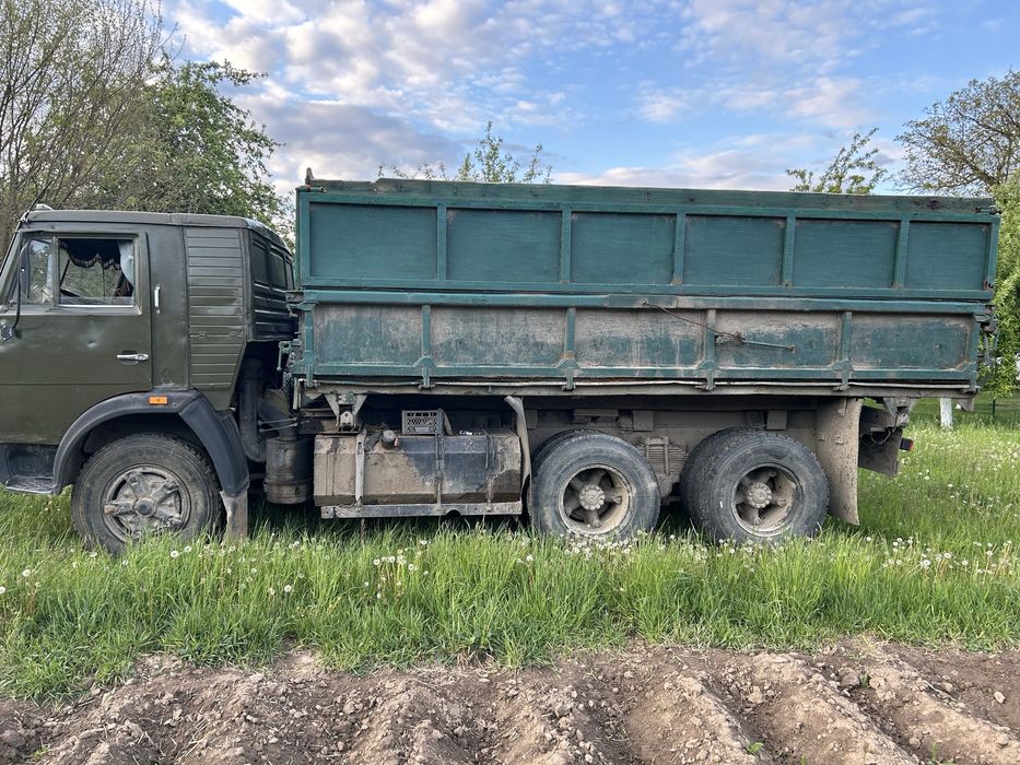 Камаз самоскид з причепом.
