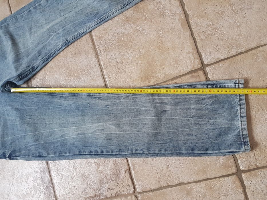 Nowe męskie spodnie Reserved rozmiar 33