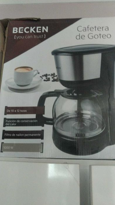 Maquina de cafe, a funcionar