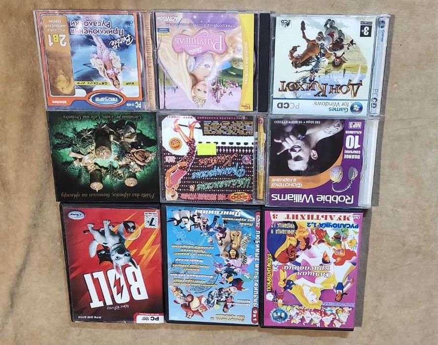 Диски CD, DVD кіно, мультики, караоке, колекції