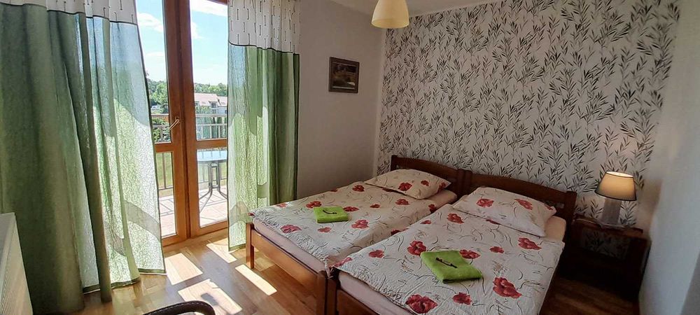 "Słoneczna Ostoja" Pokoje gościnne Apartamenty Mikołajki Mazury