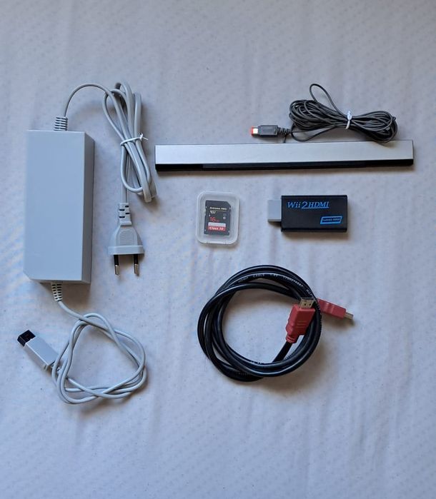 Wii (Unlocked) + Controller + Games64752385042435122