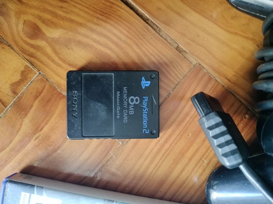 PS2  em ótimo estado com alguns jogos