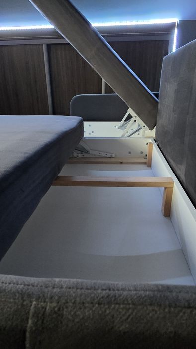 Szary narożnik z funkcją spania (140x200)