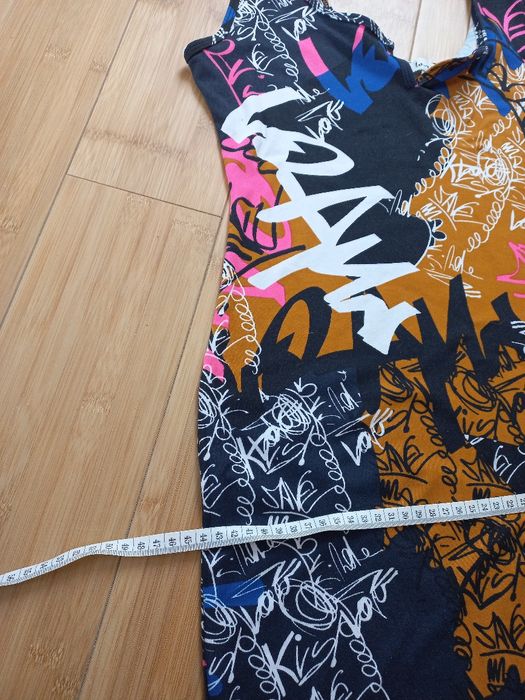 Dopasowana kobieca sukienka rozm 40- 42 USA