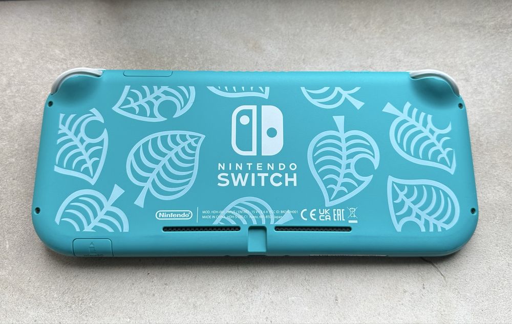 Nintendo switch lite com animal crossing e sd 8gb