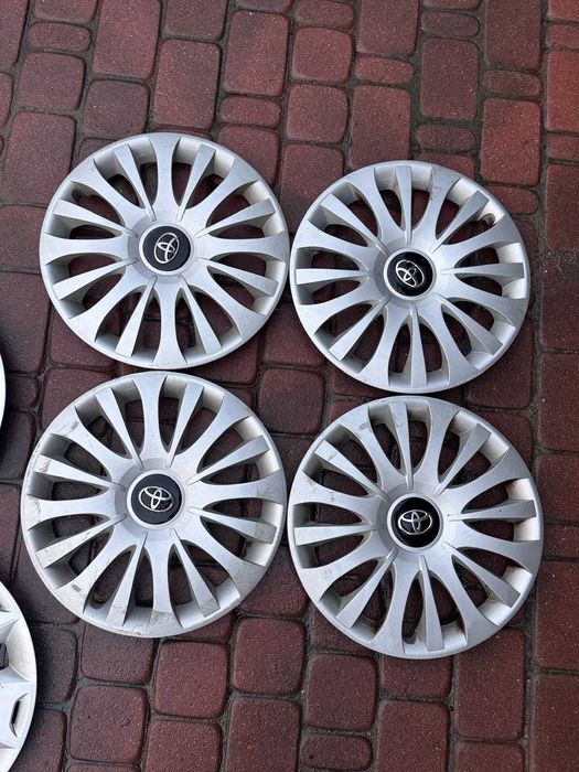 '15 Kołpaki komplet oryginalne Toyota Yaris Auris Aygo Avensis Proace