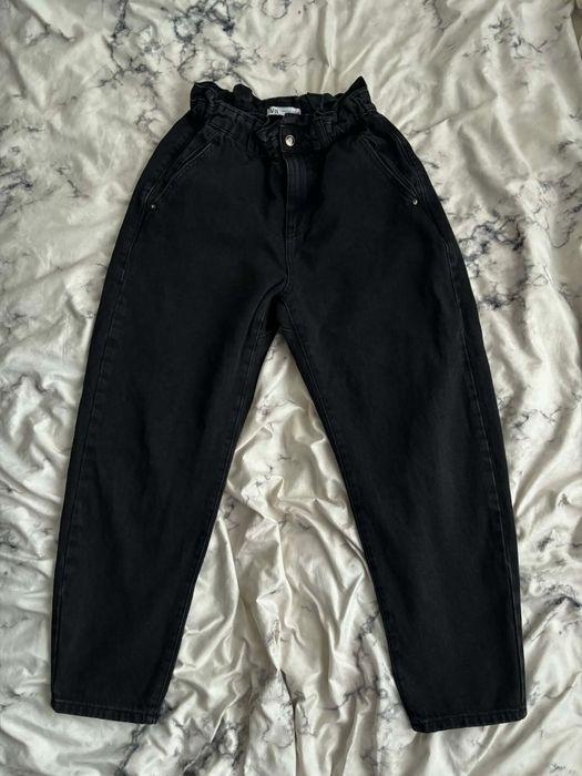 Czarne spodnie jeansowe zara