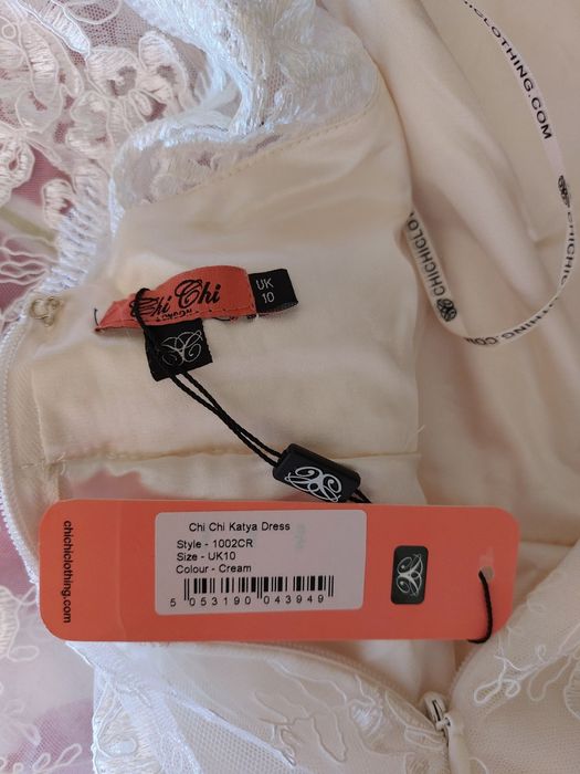 Suknia ślubna kremowa midi r.38"Chi Chi London " nowa