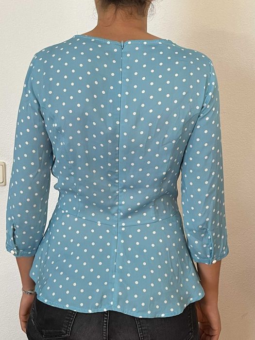 Blusa em azul turquesa, mangas a 3/4
