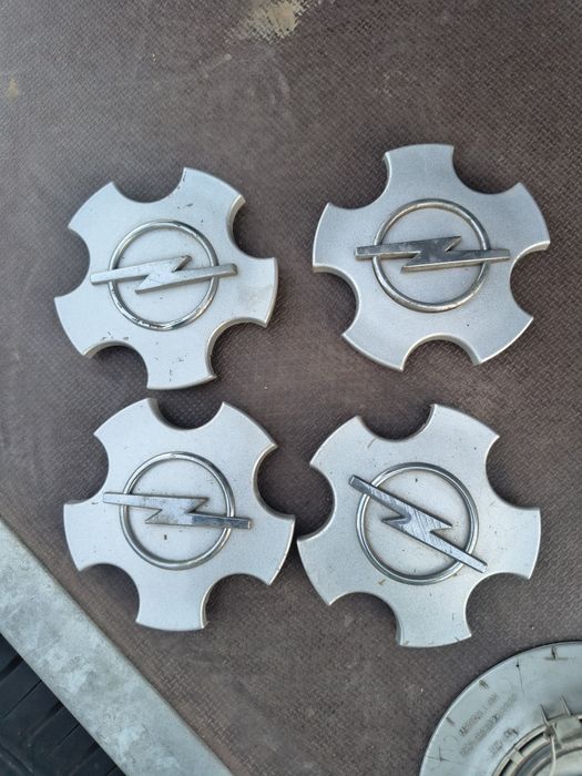 Dekielki zaślepki felg aluminiowych Opel Astra H