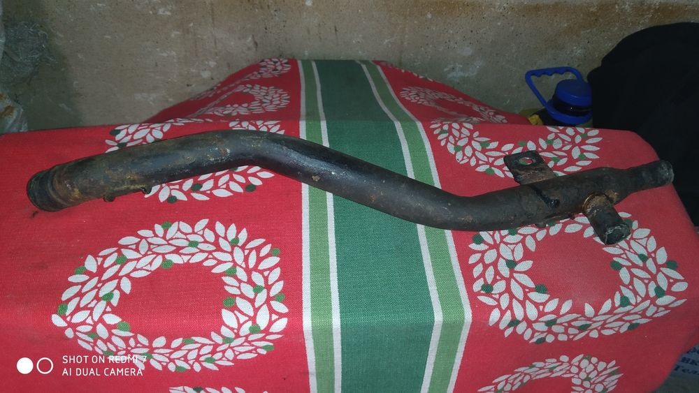 Патрубок отопителя