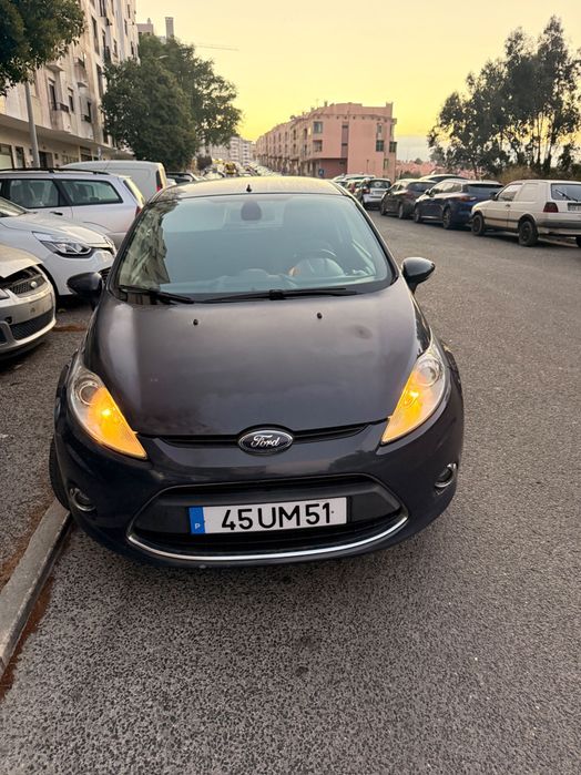# Ford Fiesta 1\.6 TDCi Econetic 2011 – Diesel Económico \| Ar Condicionado \| 3 Portas — photo 3