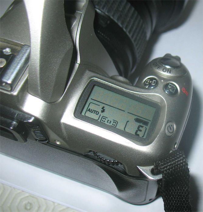 Nikon F55, Lente Tamron AF 19-35mm, Filtro Nikon NC 77mm,Bolsa Soligor