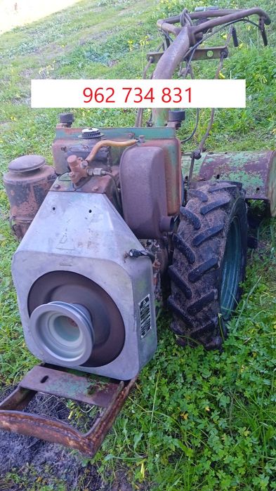 Trator moto-cultivador 14 cv.