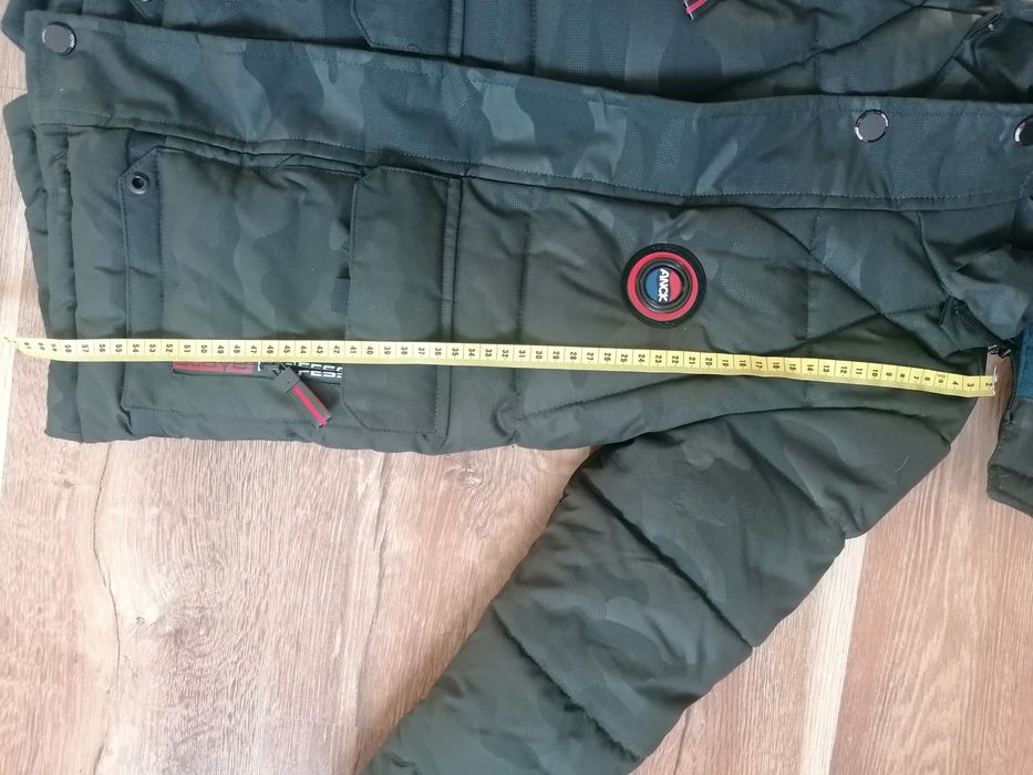 Зимова, тепла куртка 134 см