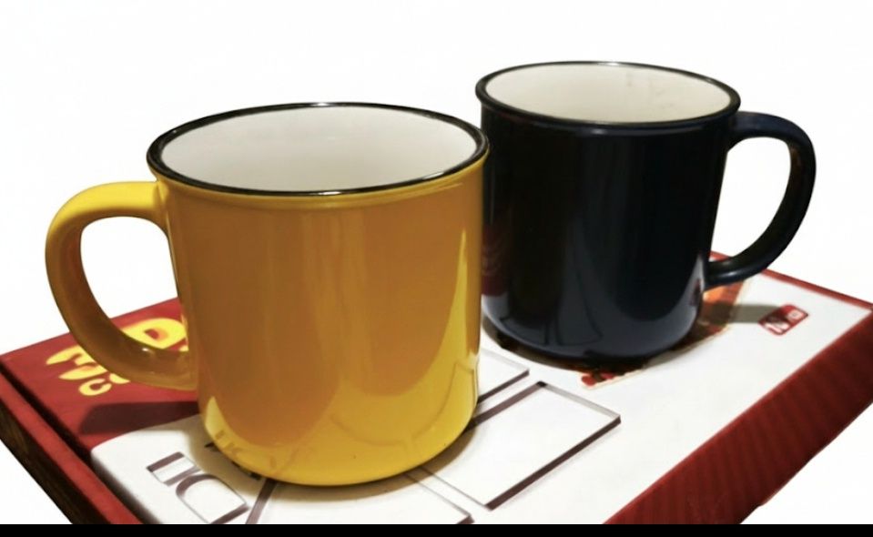 Патріотичний набір з 2 чашок для кави: жовта та синя

Об'єм близько 25