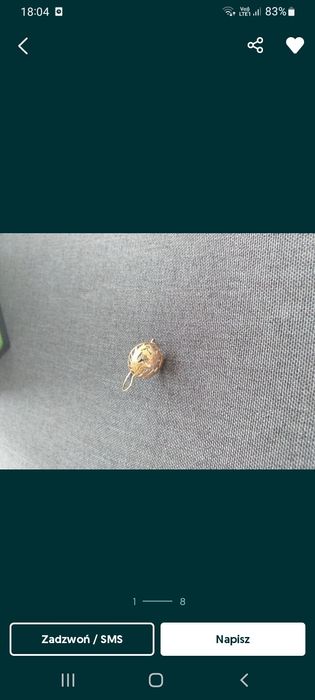 Złote kolczyki okazałe.