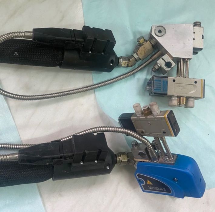 System do kleju Nordson DuraBlue 4 z głowicami MiniBlue II SureBead