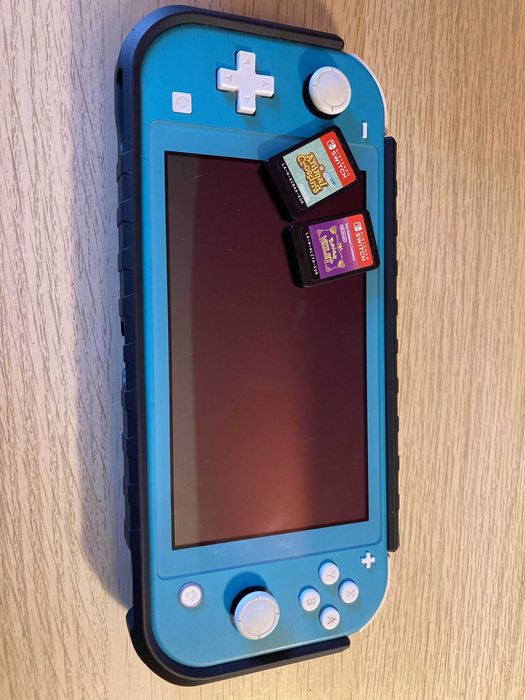 Nintendo Switch Lite azul - com capa, bolsa e 2 jogos
