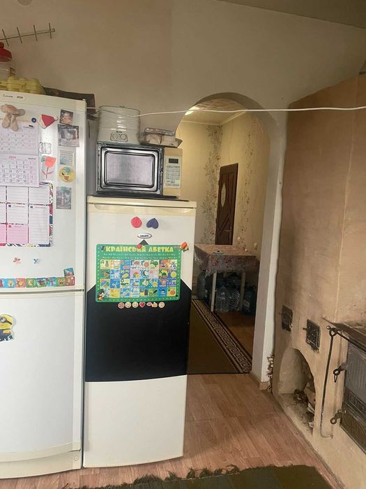 Житловий будинок та земельна ділянка 10 сот., м. Жовква