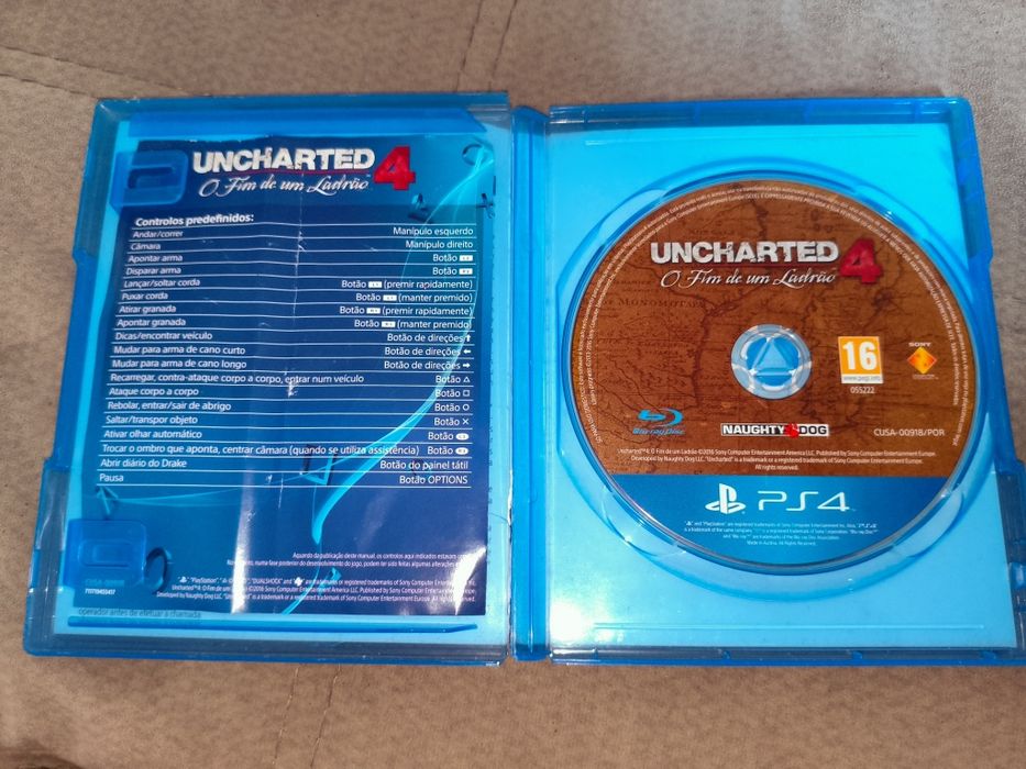 Uncharted 4 O Fim de um Ladrão em boas condições tirando a caixa que está um pouco rasgada de lado para, PlayStation 4