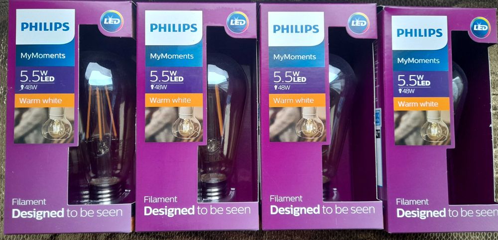 Филаментные лампы Philips Filament LED 5,5W E27  новые  4шт.
