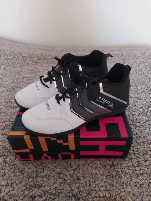 Buty białe biało - czarne sportowe