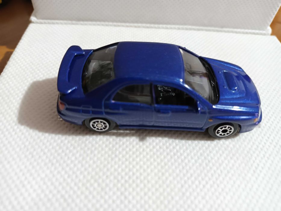 Mimiaturas 1/64 Welly CM2