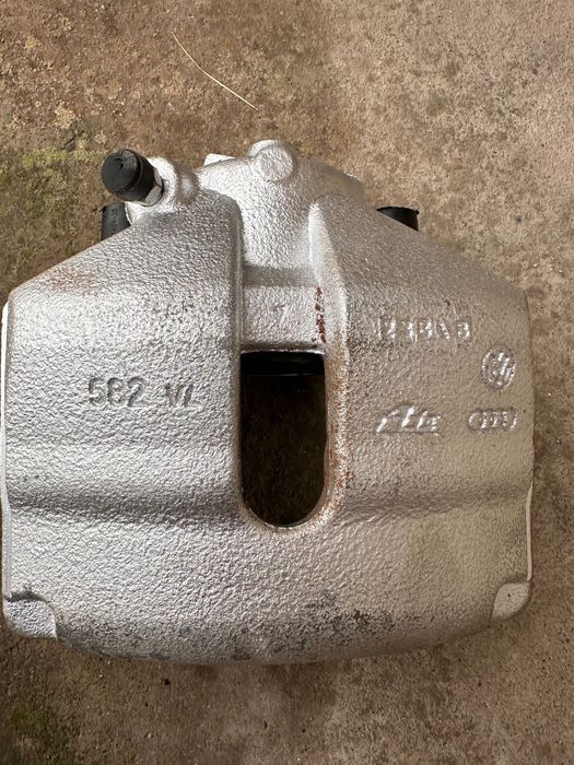 1K0615124E Суппорт передній RH Audi TT A3 A1 VW Golf Jetta B6 B7 EOS