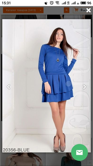 Продам Крассивый костюм цвет электрик юбка+кофточка