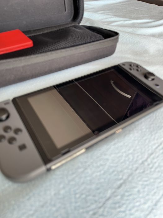 Nintendo Switch V1 Cinzenta c/ case pequena