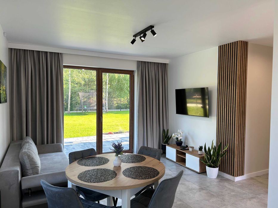 Pod Brzozami-domki całoroczne Balia jacuzzi noclegi Bałtów