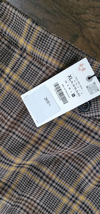 Nowe spodnie w kratę Zara rozm.XL